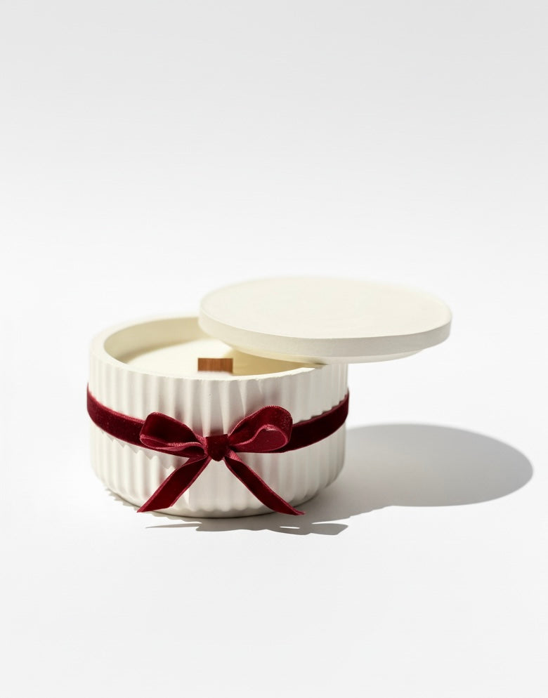Handmade soy candle in plaster holder with wooden wick and red velvet ribbon — Cozy Sweet Home gift-ready candle